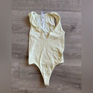 Urban Outfitters | Ribbed Yellow V Neck Bodysuit